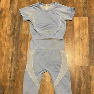 New worn athletic set. Light blue 2 piece set. Size S/M